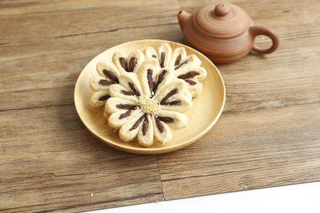 菊花饼e12d22bc2cbbb627c07653856bad.jpeg